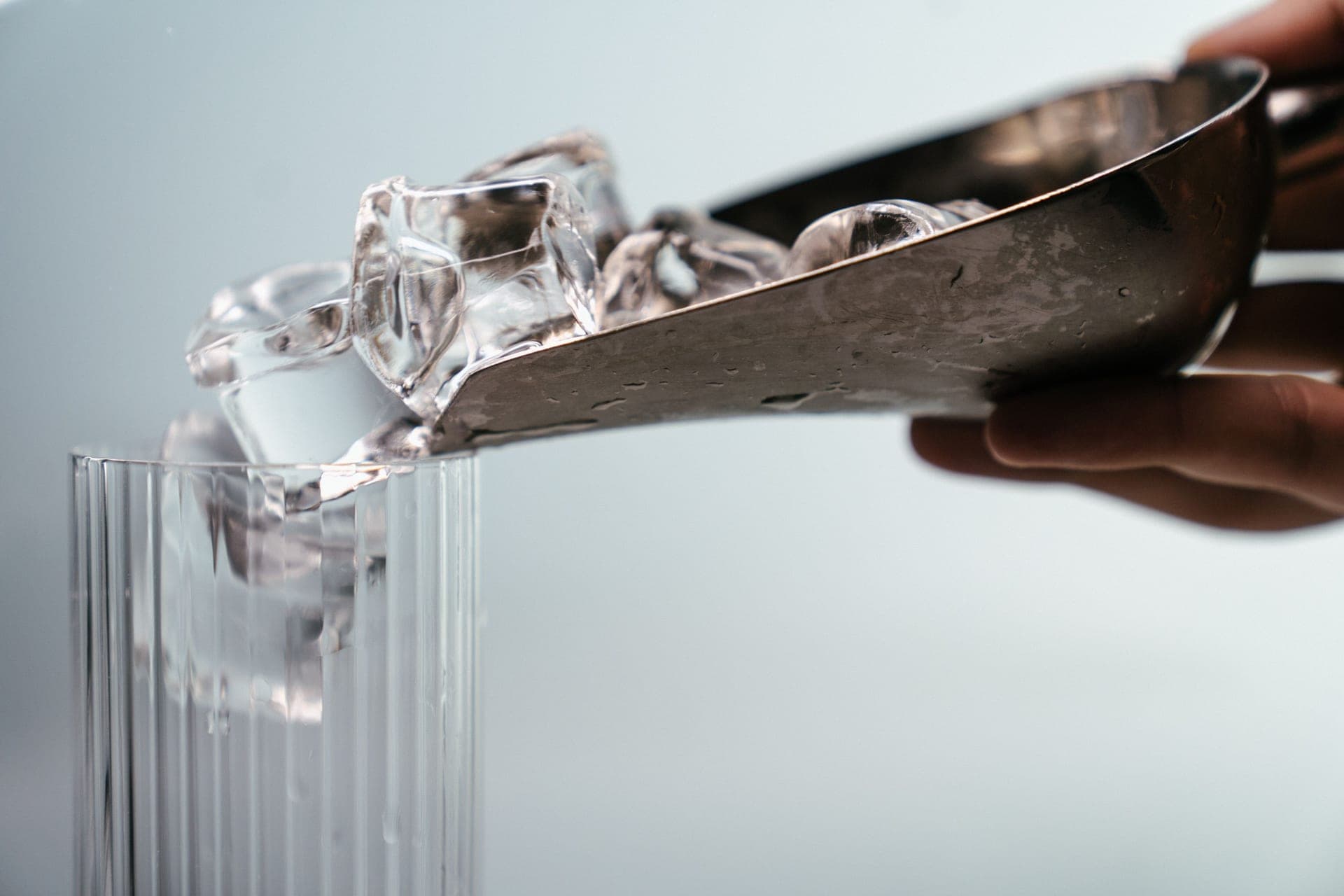 Close-up of soft nugget ice spilling from a scoop